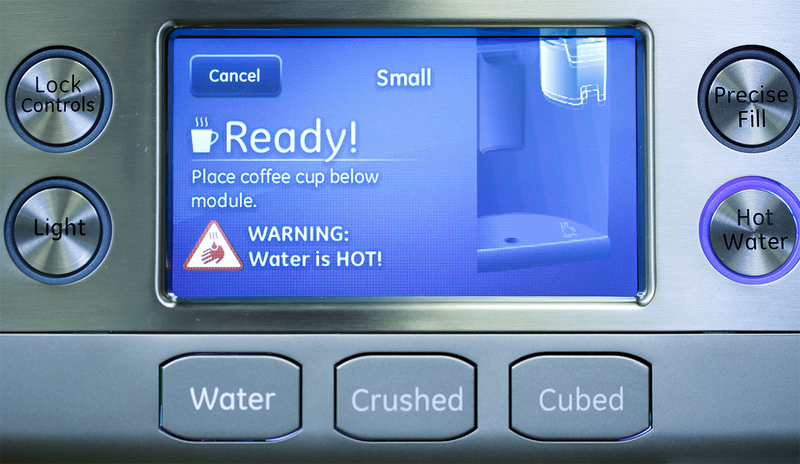 Illustration for article titled GE's New Fridge Has a Keurig Coffee Machine Built Right Into the Door
